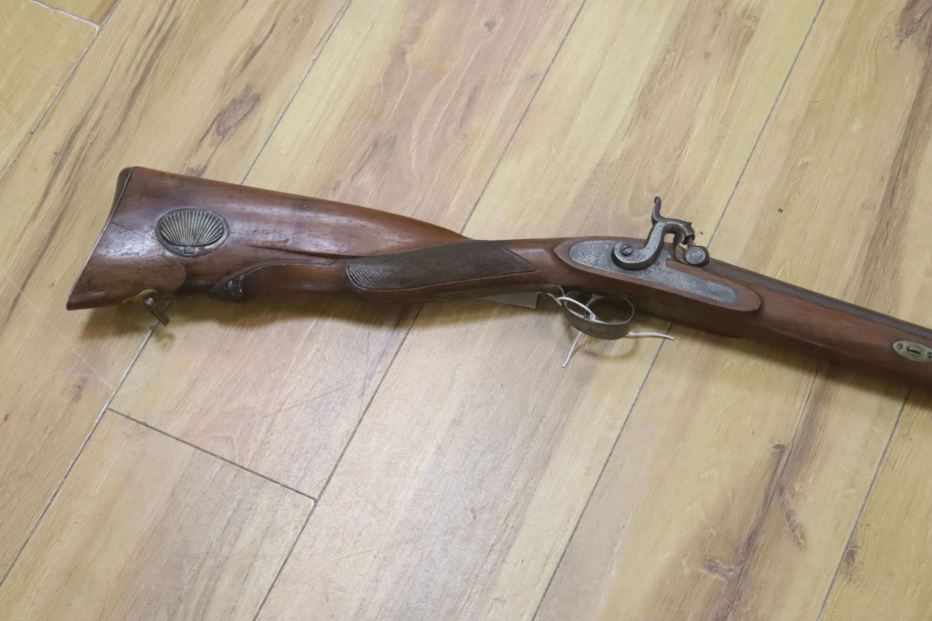 A 19th century percussion musket, barrel impressed Fabricado por Thomas Beristain Eibar, 1864, walnut stock with ramrod, 126cm